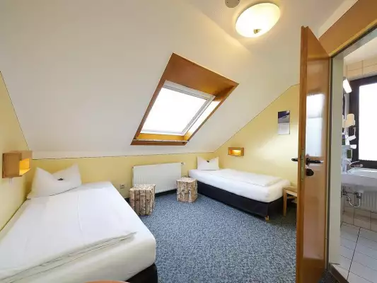 Ein Doppelzimmer im Landhotel Karrenberg