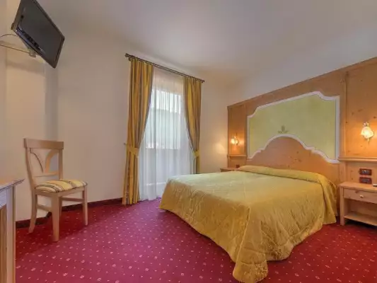 Ein Zimmer im Hotel Garnì La Vigna